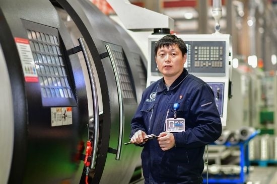 孫明在數(shù)控機床生產(chǎn)車間。航空工業(yè)沈飛供圖