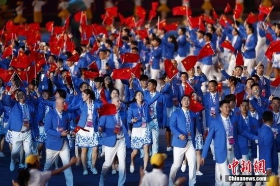 資料圖：9月23日，杭州第19屆亞運會開幕式舉行。中國代表團身著星辰藍禮服驚艷亮相。<a target='_blank' href='/'><p align=