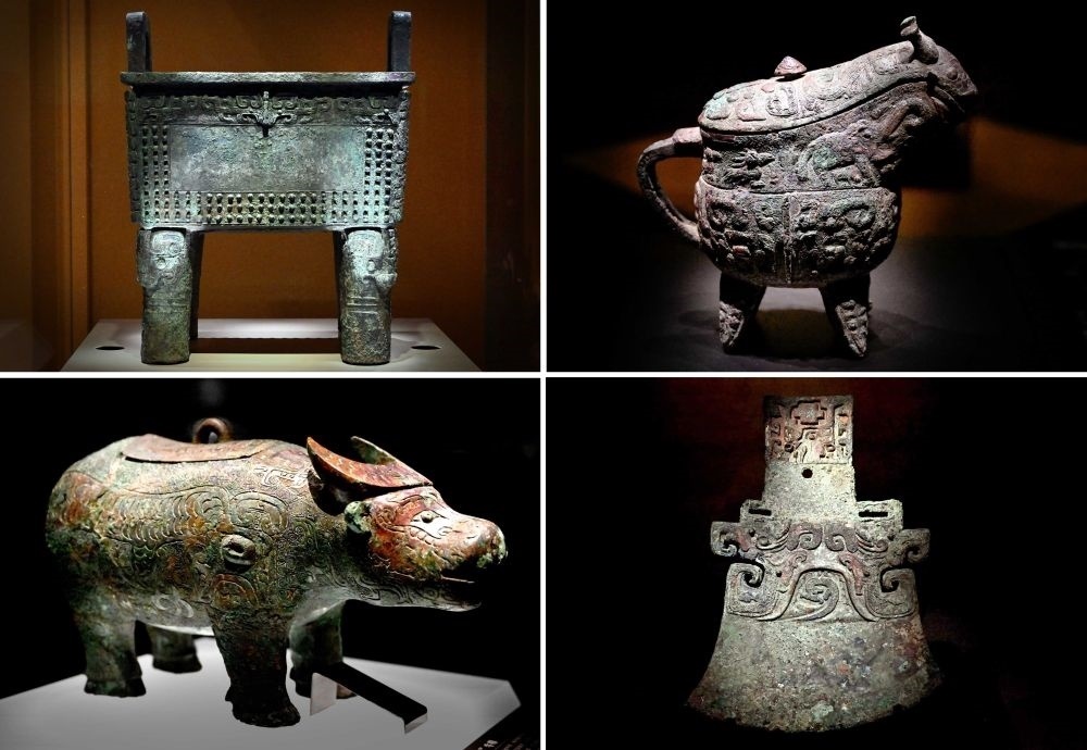 這是殷墟博物館新館內(nèi)展出的“司母辛”銅鼎（左上）、“亞長(zhǎng)”銅觥（右上）、“亞長(zhǎng)”牛尊（左下）、“亞長(zhǎng)”銅鉞（拼版照片，2月23日攝）。